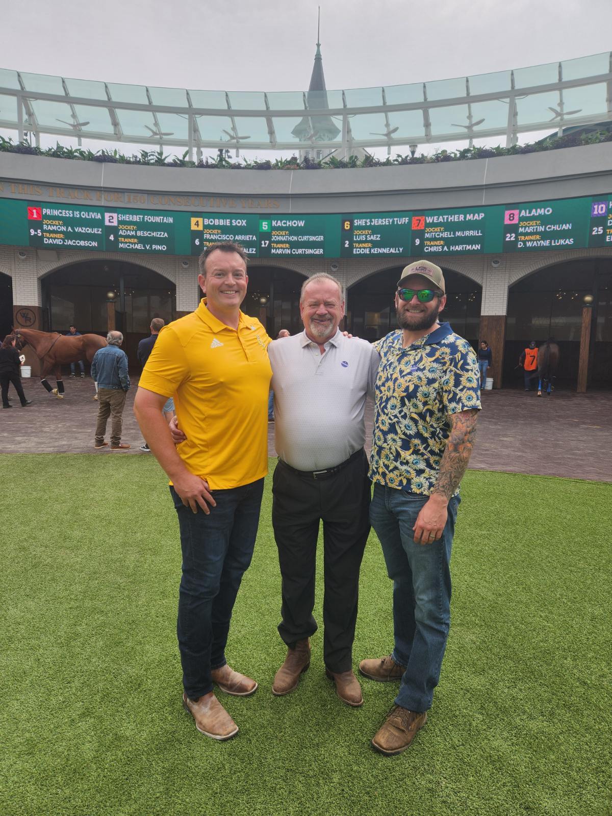 Adam Billings at Churchill Downs with his father and brother