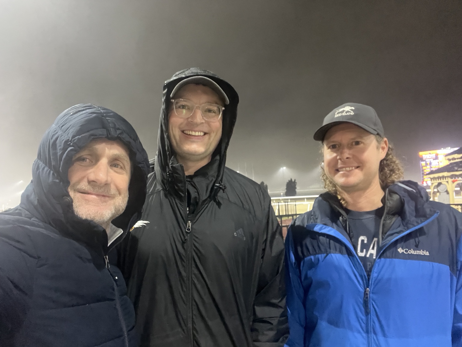 Adam Billings at Turfway Park with his friend John and trainer Quinn Howey